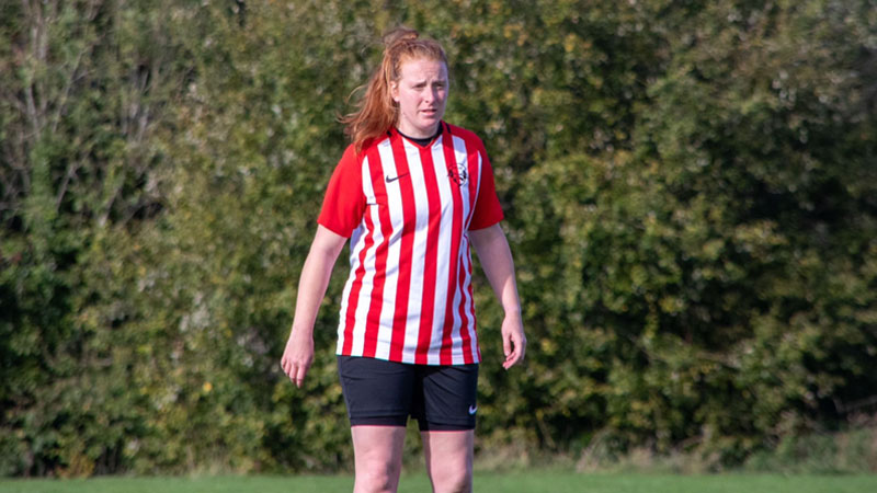 Caroline Hughes playing football